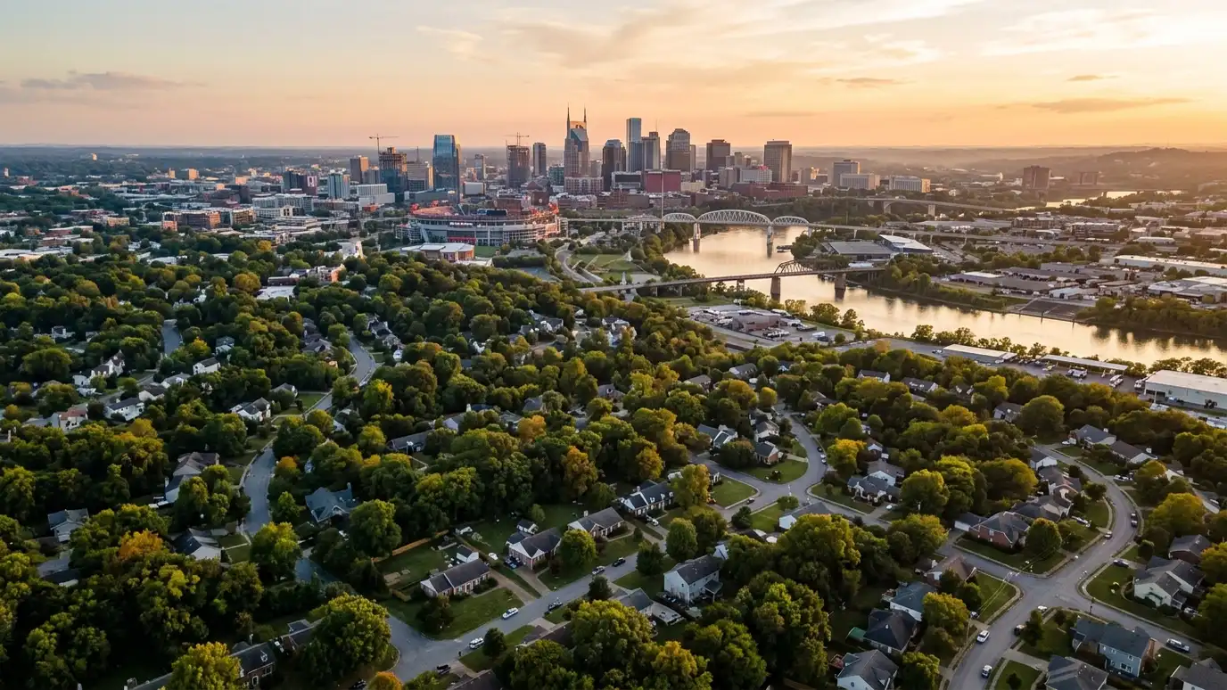 Appliance repair service areas | Nashville and Middle Tennessee Aerial view of the Nashville skyline at golden hour above tree-covered suburban neighborhoods with homes and winding streets